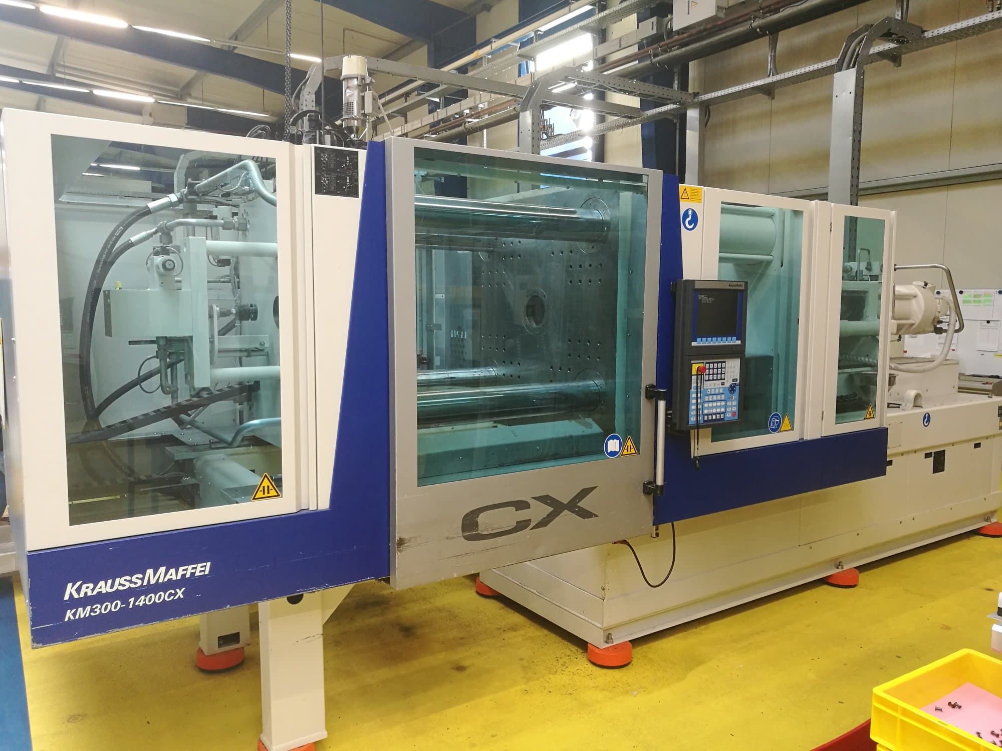 Prikaz  stroja Krauss Maffei 300-1400 CX sprijeda