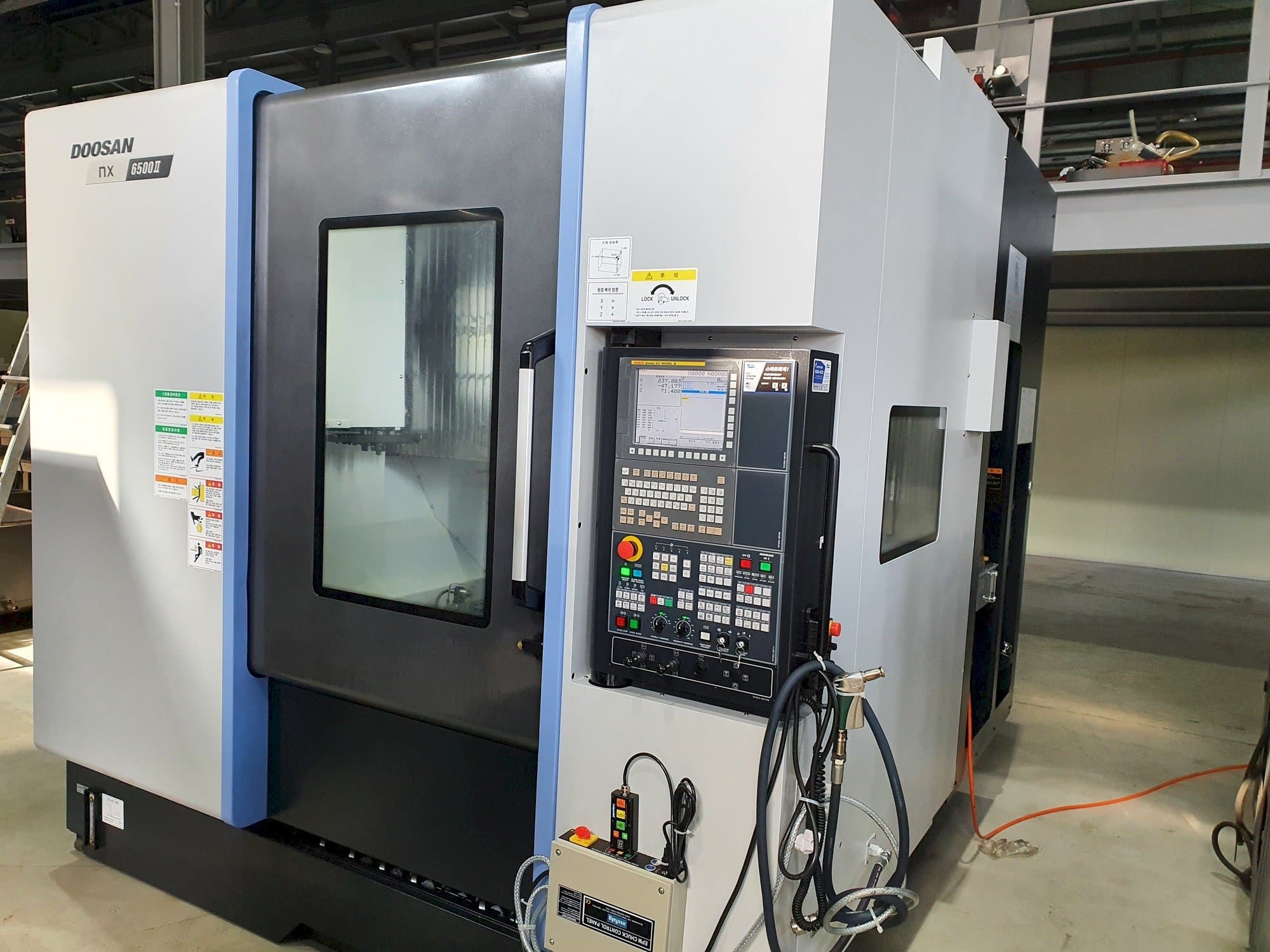 Prikaz  stroja Doosan NX6500Ⅱ  sprijeda