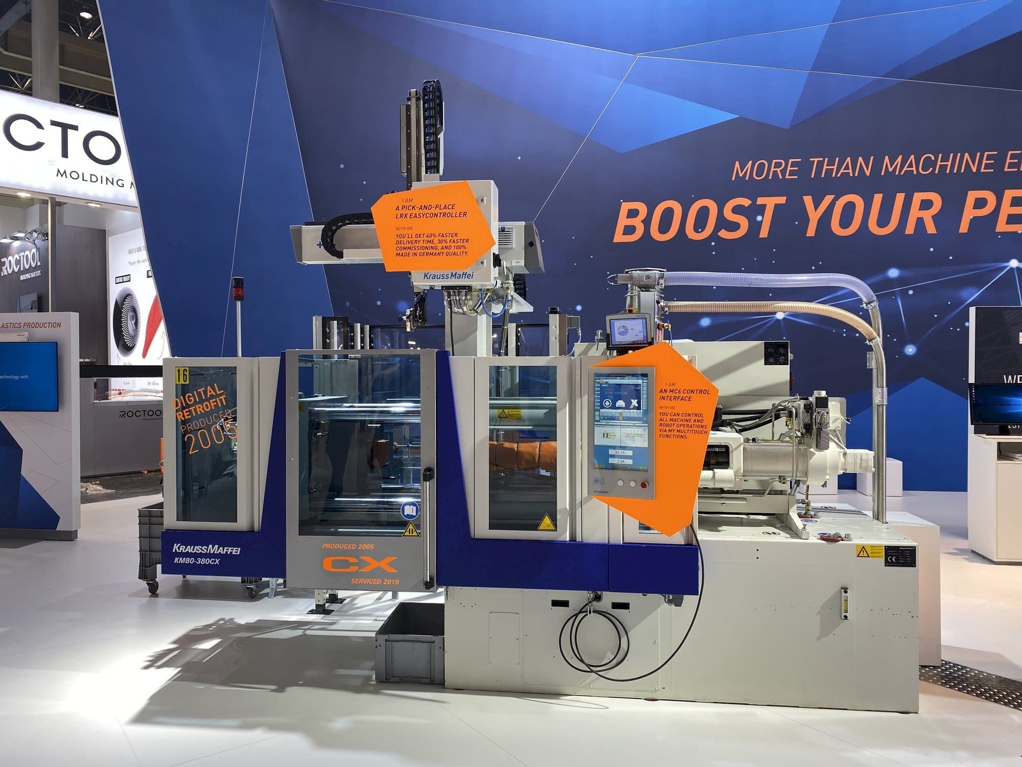 Prikaz  stroja Krauss Maffei 80-380 CX + LRX easyControl 100  sprijeda