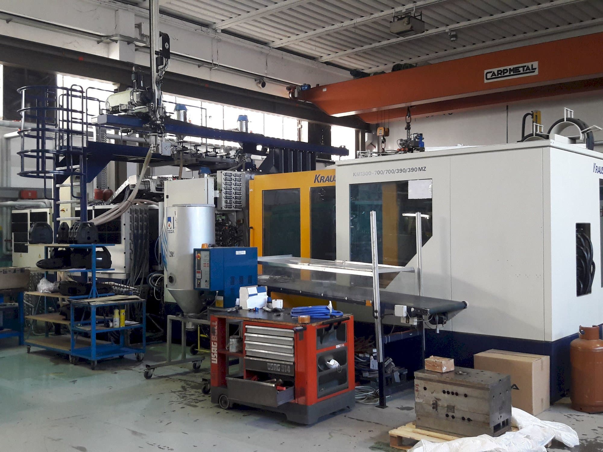 Prikaz  stroja Krauss Maffei 1300-700-700-390-390 MZ  sprijeda