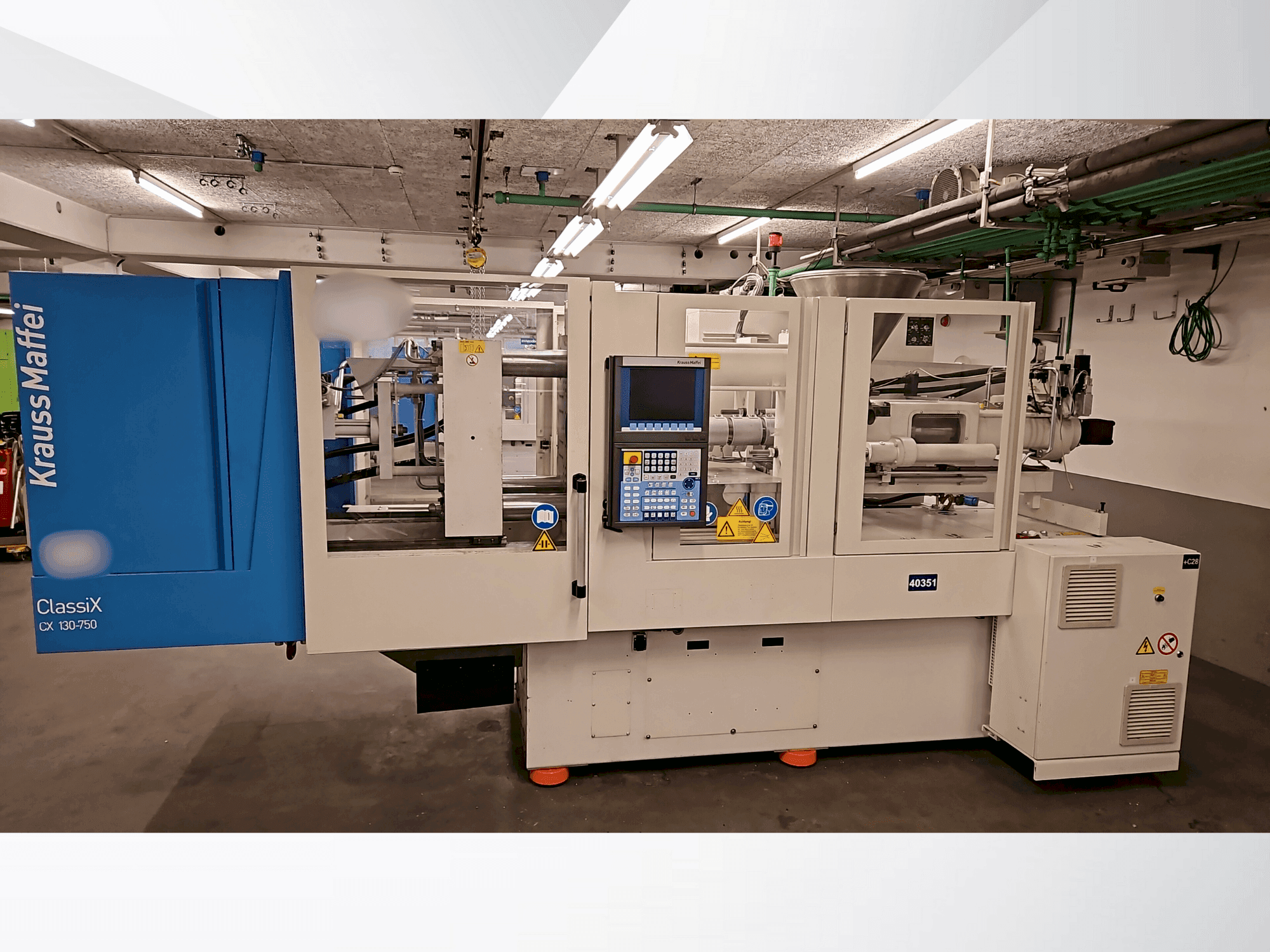 Prikaz  stroja Krauss Maffei 130-750 CX  sprijeda