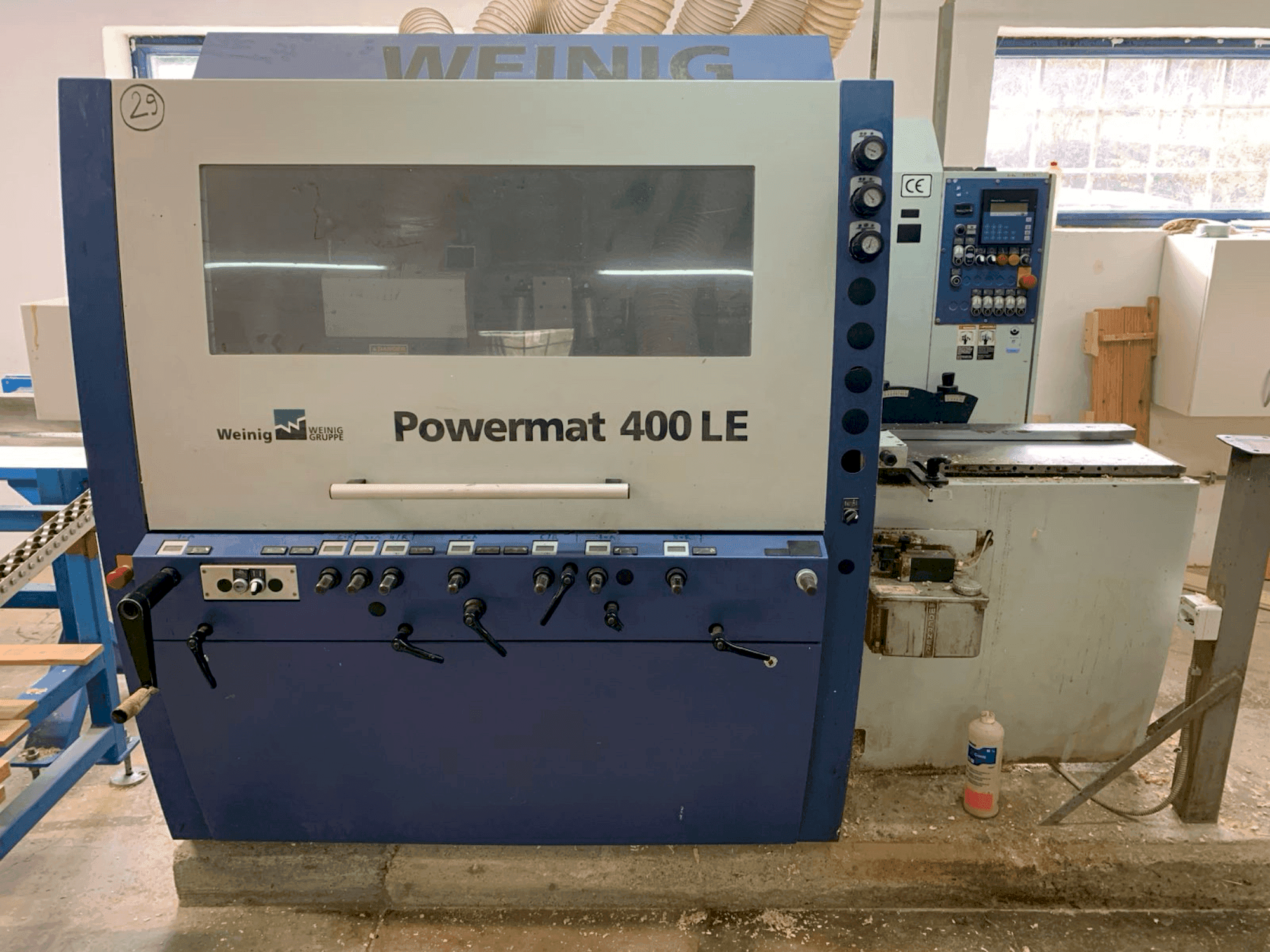 Prikaz  stroja WEINIG / DIMTER POWERMAT 400LE  sprijeda