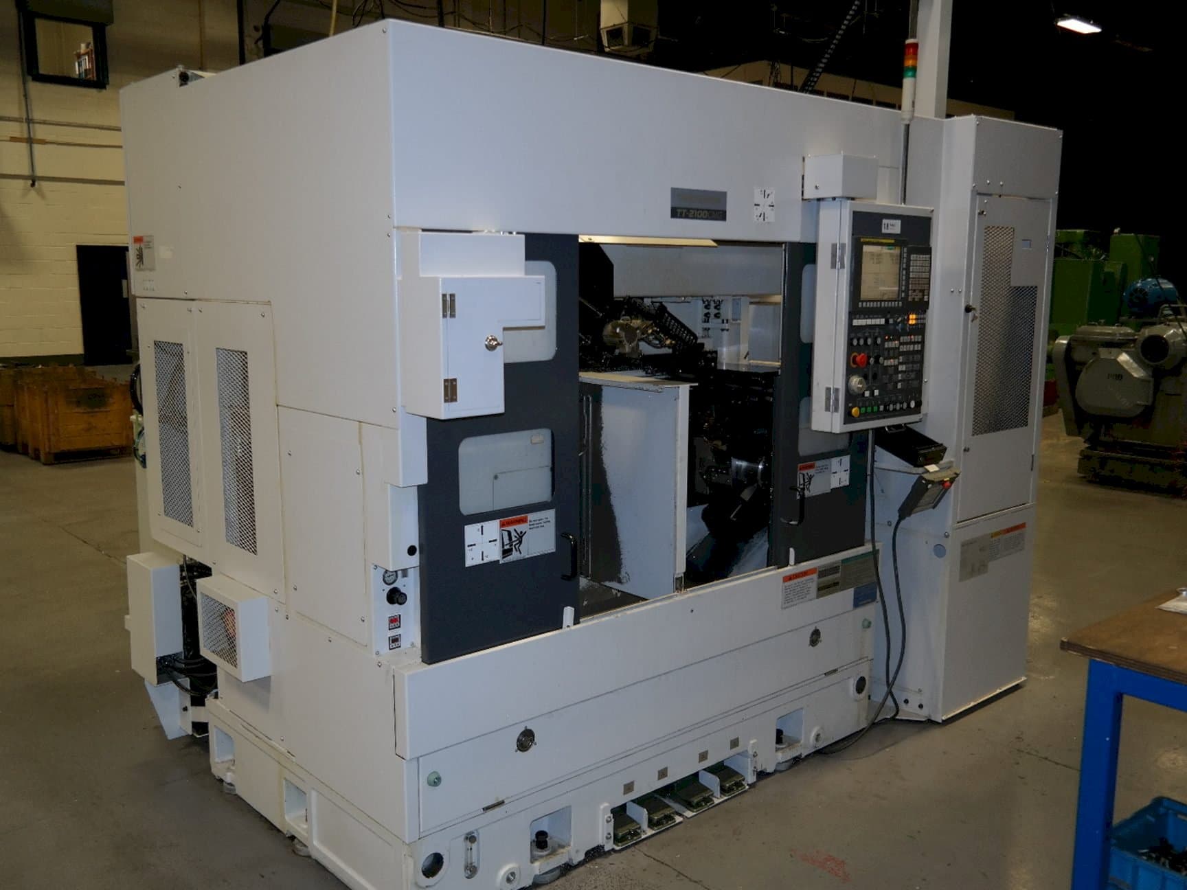 Prikaz  stroja Takisawa TT2100CMGA  sprijeda