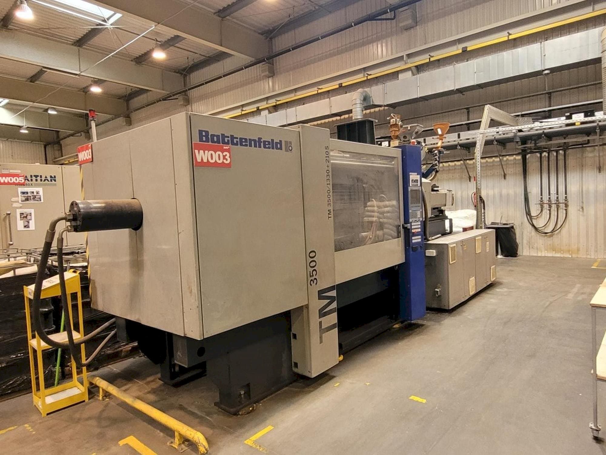 Prikaz  stroja Battenfeld TM 3500/1330+210S  sprijeda