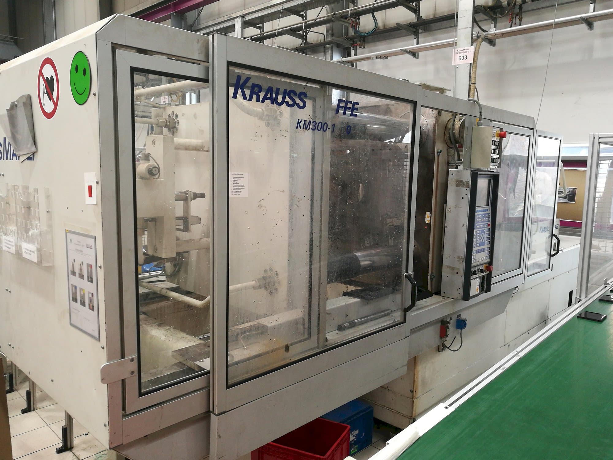 Prikaz stroja Krauss Maffei KM 300-1400 C2 slijeva