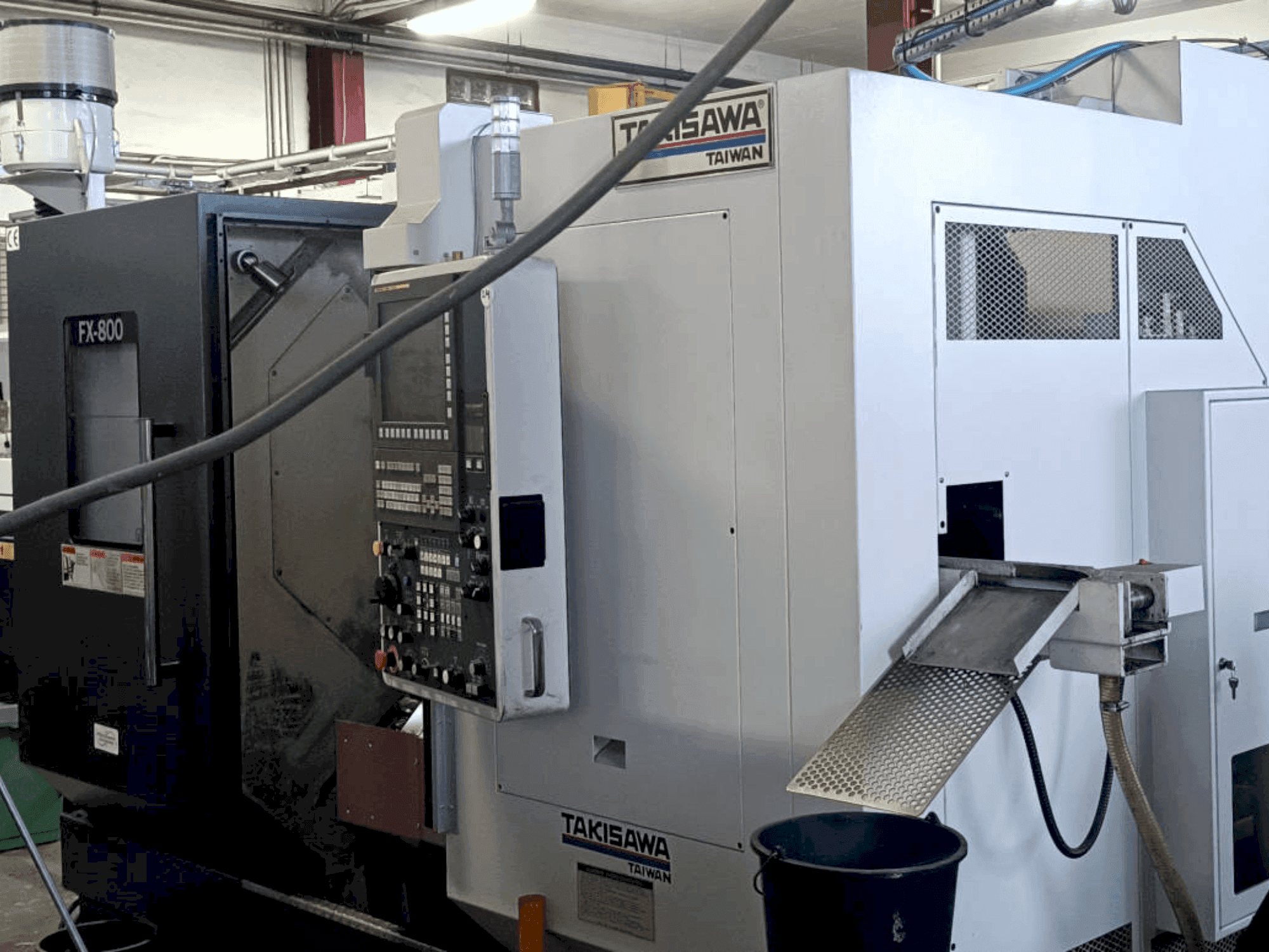 Prikaz  stroja Takisawa FX800  sprijeda