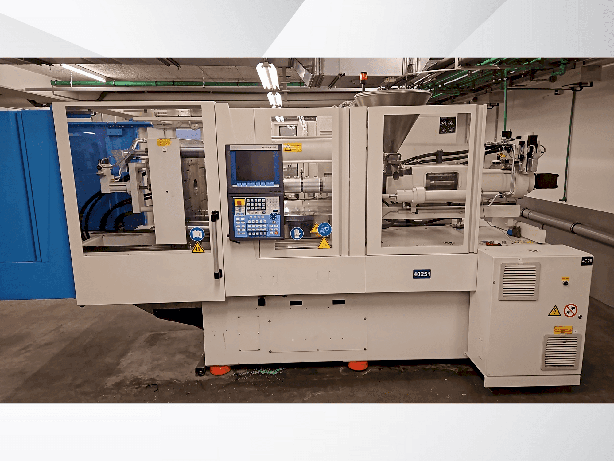 Prikaz  stroja Krauss Maffei 110-750 CX  sprijeda