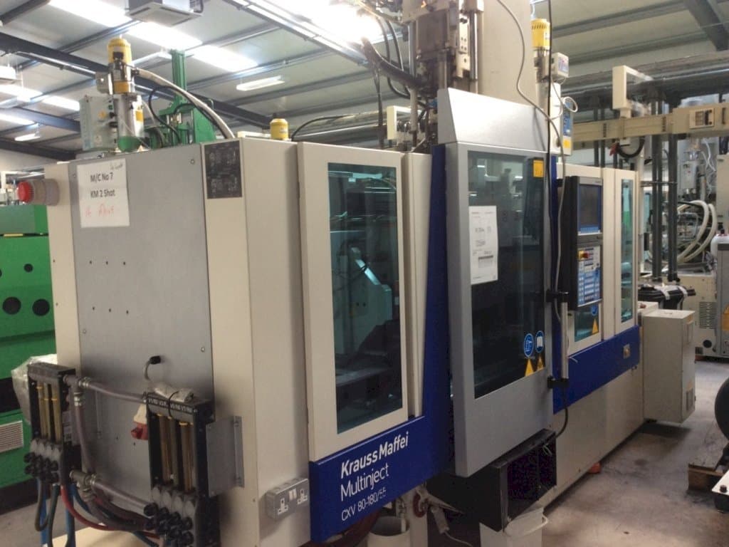 Prikaz  stroja Krauss Maffei Multinject 80-180-55 CX V  sprijeda