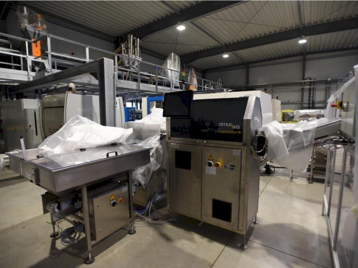 Prikaz  stroja INTRAVIS Capwatcher 6275  sprijeda