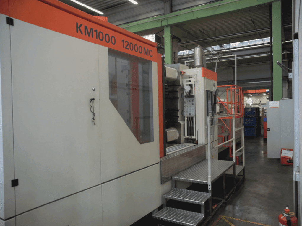 Prikaz  stroja Krauss Maffei 1000-12000 MC  sprijeda