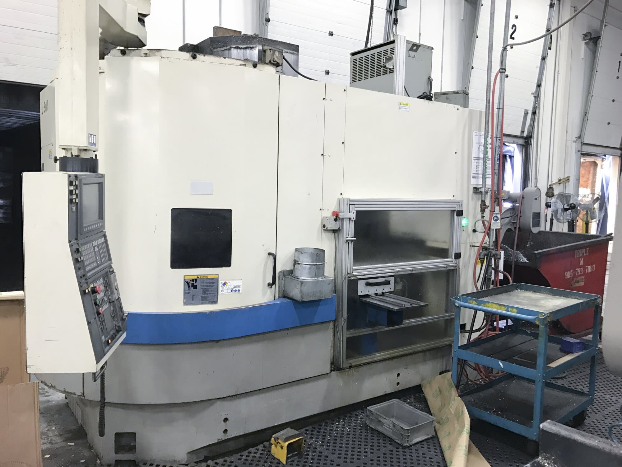 Prikaz stroja Okuma LVT 400 slijeva