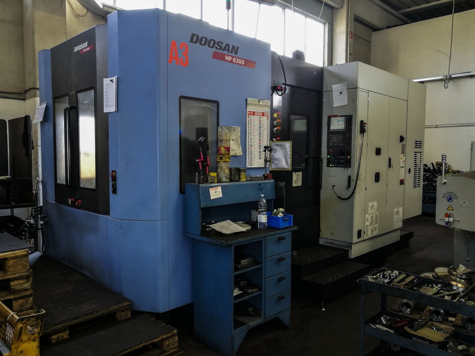 Prikaz stroja Doosan HP 6300 slijeva