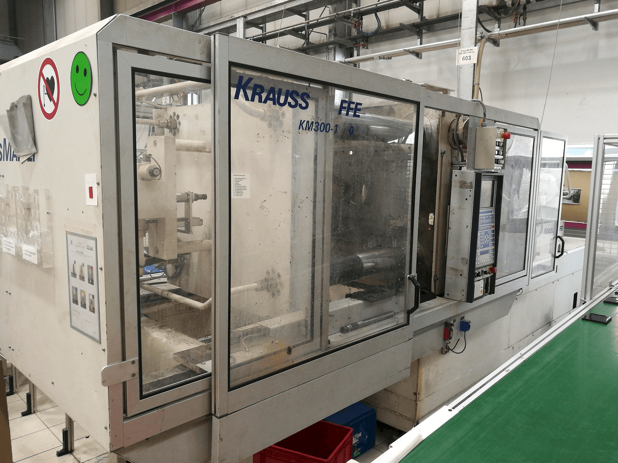 Prikaz stroja Krauss Maffei KM 300-1400 C2 slijeva