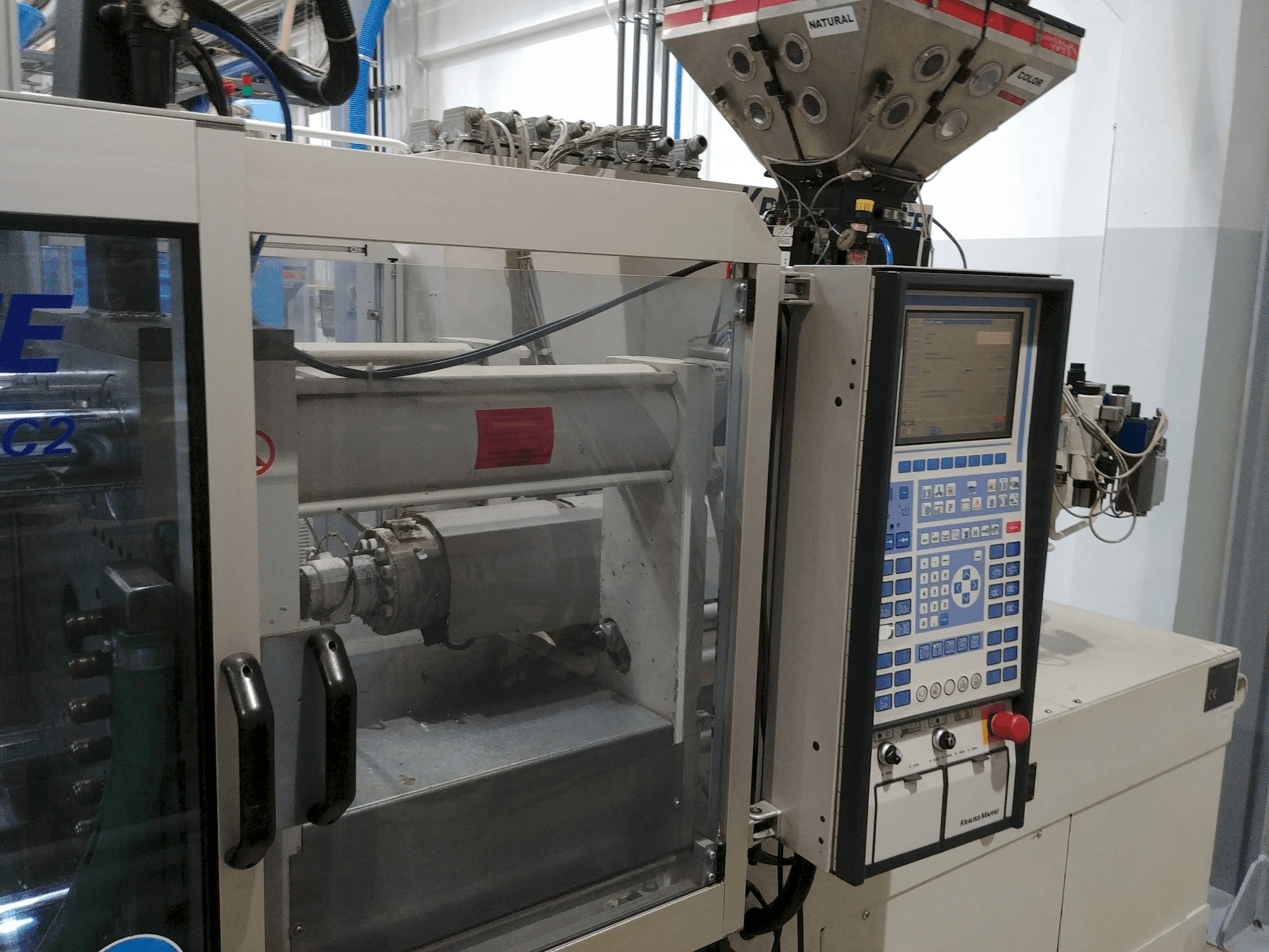 Prikaz stroja Krauss Maffei KM 80-220 C slijeva