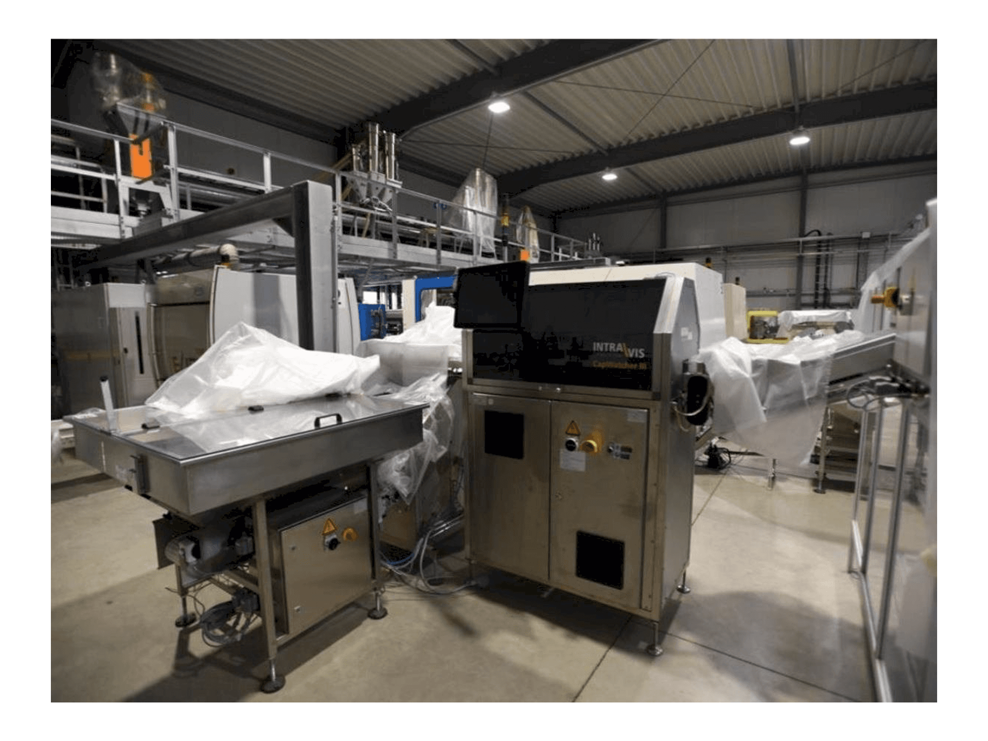 Prikaz stroja INTRAVIS Capwatcher 6275 sprijeda