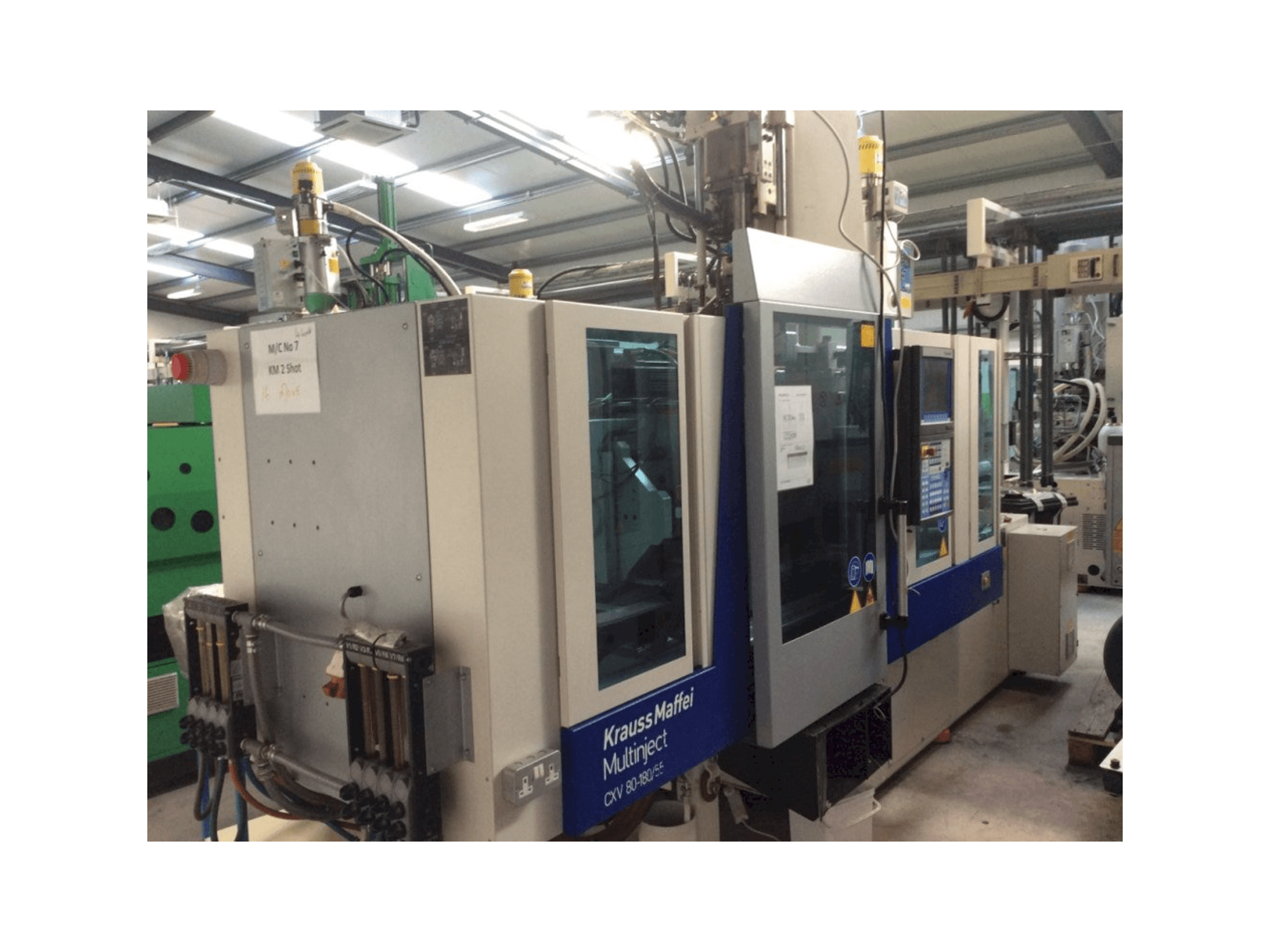 Prikaz stroja Krauss Maffei Multinject 80-180-55 CX V sprijeda