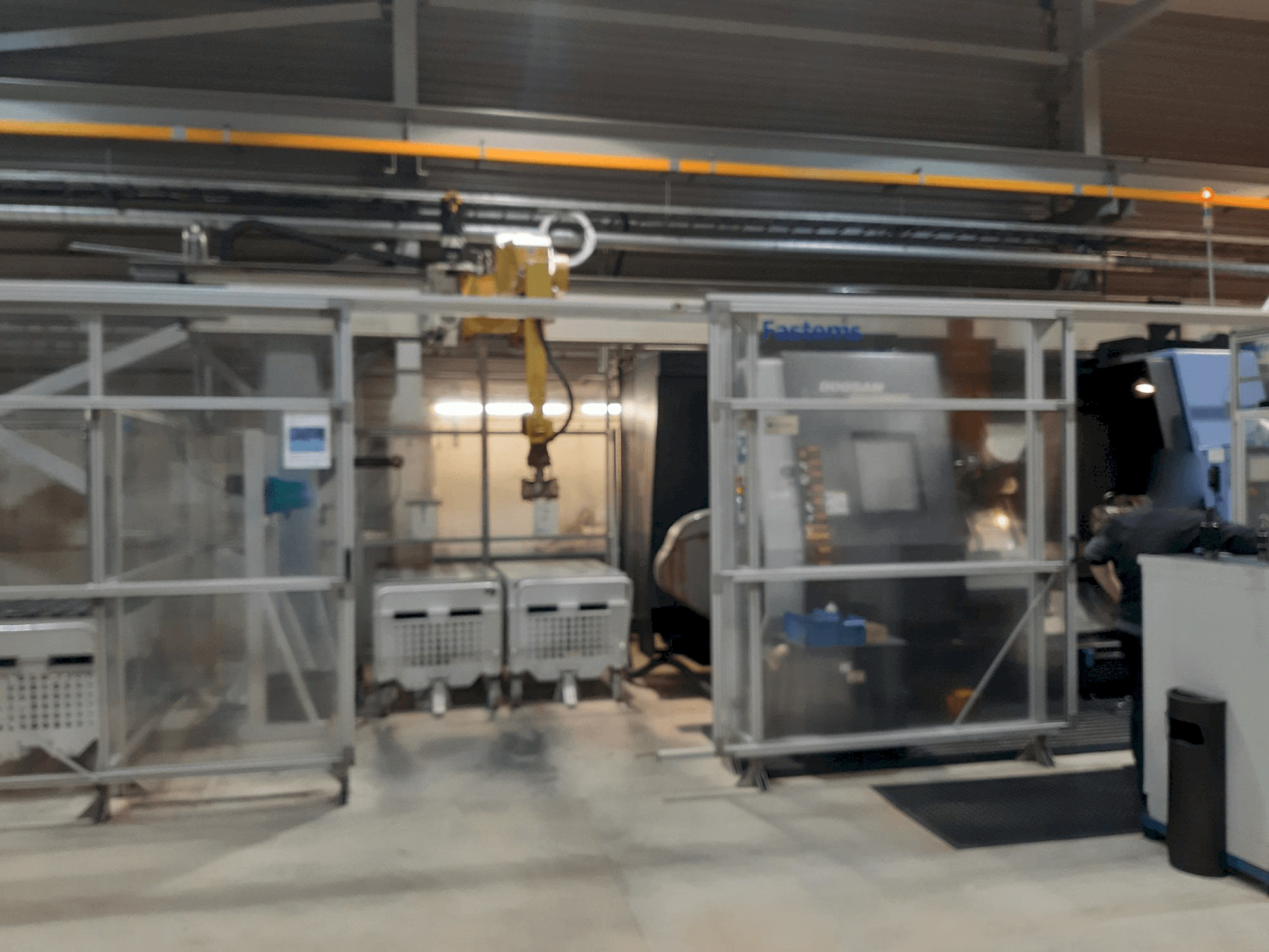 Prikaz stroja Fastems RPC-70 with Fanuc M-710iC sprijeda